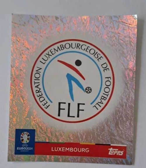 Topps - UEFA Germany Euro 2024 Αυτοκόλλητο - LUX 1.
Logo (Luxembourg) - Holo Foil