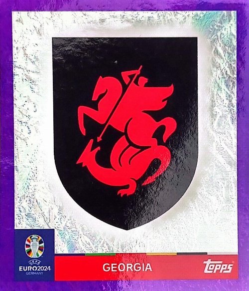 Topps - UEFA Germany Euro 2024 Αυτοκόλλητο - GEO 1.
Logo (Georgia) - Purple Parallel Foil