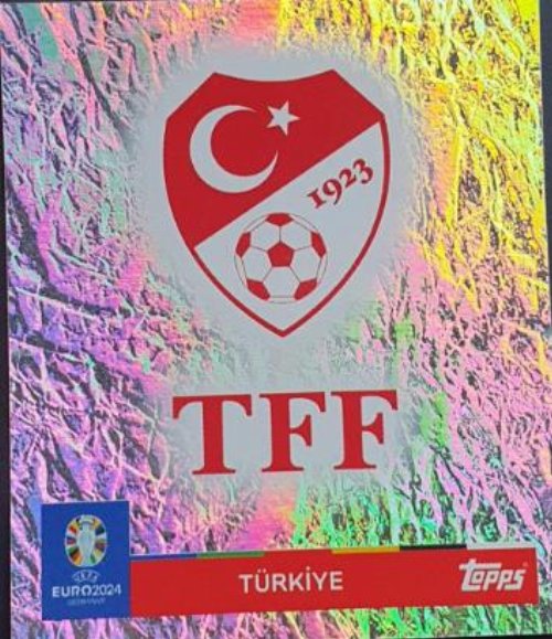 Topps - UEFA Germany Euro 2024 Αυτοκόλλητο - TUR 1.
Logo (Turkey) - Holo Foil