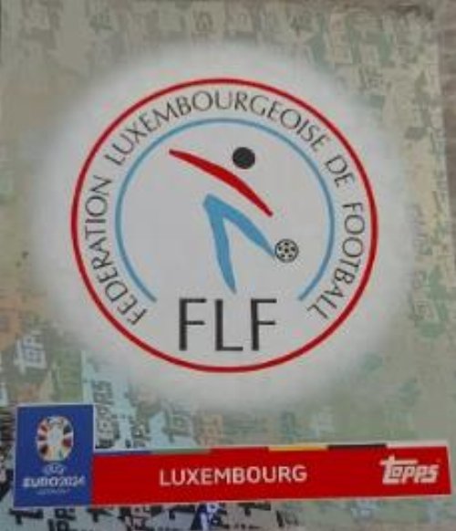 Topps - UEFA Germany Euro 2024 Αυτοκόλλητο - LUX 1.
Logo (Luxembourg) - Topps Parallel Foil