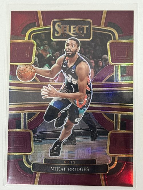 2023-24 Mikal Bridges [Maroon Prizm] #34
94/175